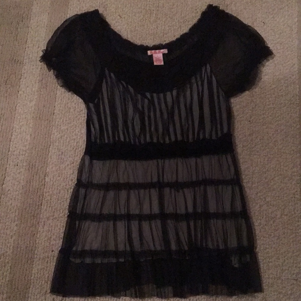 Black top with sheer illusion lining